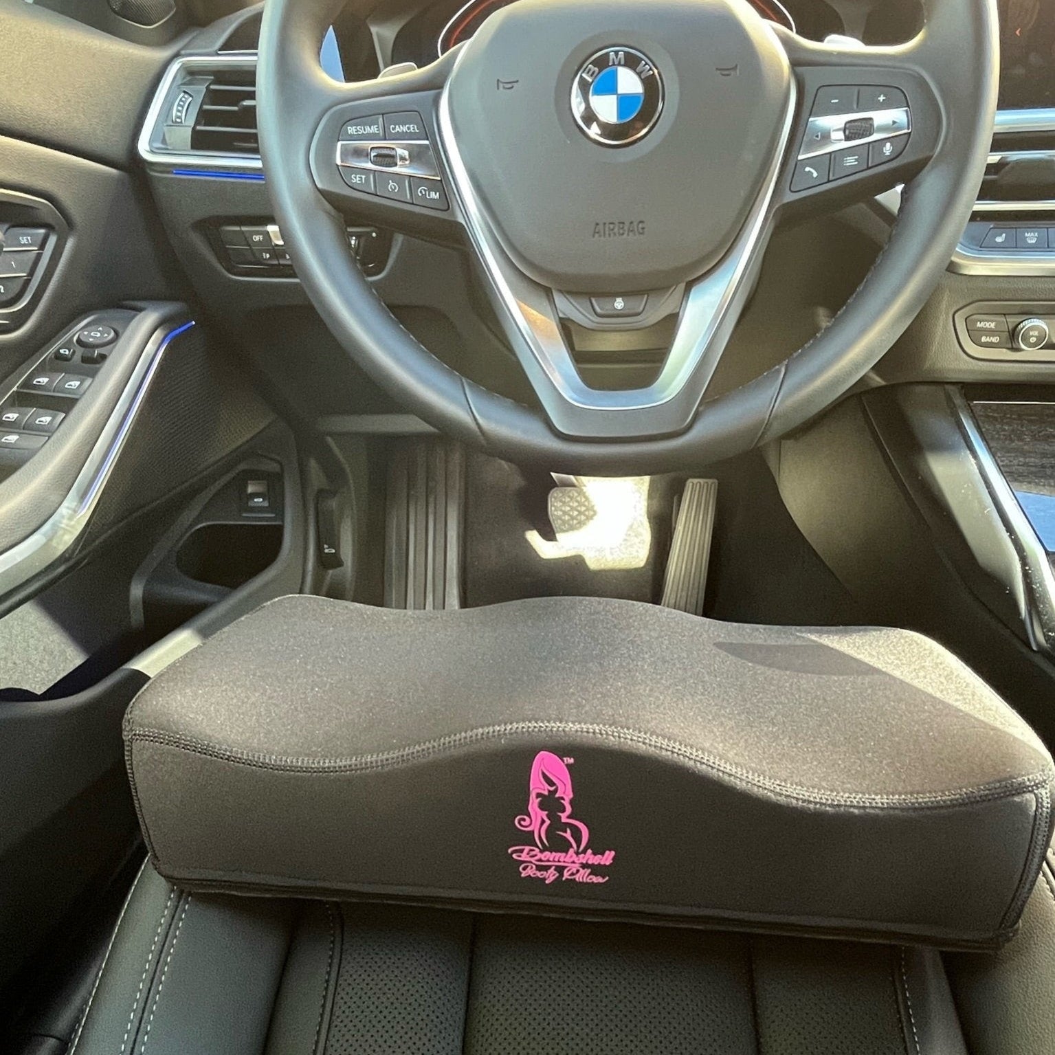Bombshell Booty Pillow BBL Car Cushion on BMW Driver Seat – Original Patented BBL Pillow for Driving After Surgery
