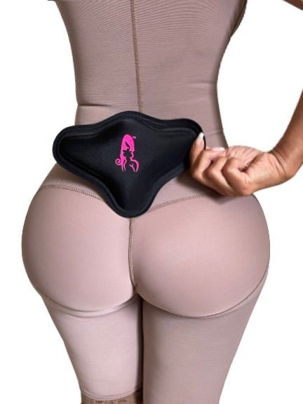 Lipo Foam Lumbar Molder Backboard – Woman Placing Back Board Over Faja Post-Liposuction Recovery – Bombshell Booty Pillow