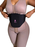Woman Adjusting Abdominal Compression Board Over Faja – Post-Lipo Ab Board for Tummy Tuck Recovery