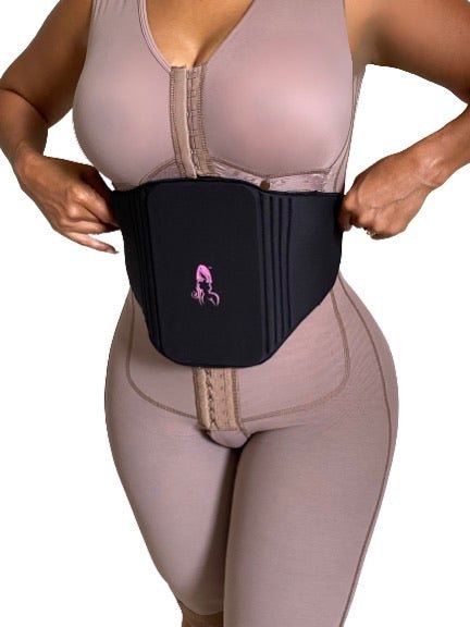 Woman Adjusting Abdominal Compression Board Over Faja – Post-Lipo Ab Board for Tummy Tuck Recovery