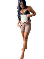 Woman in Faja Inserting Lipo Foam Pad After Liposuction – Breathable Compression Foam for Post-Op Recovery